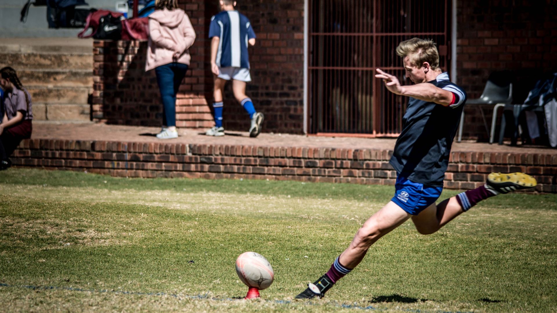 kicking in playing rugby