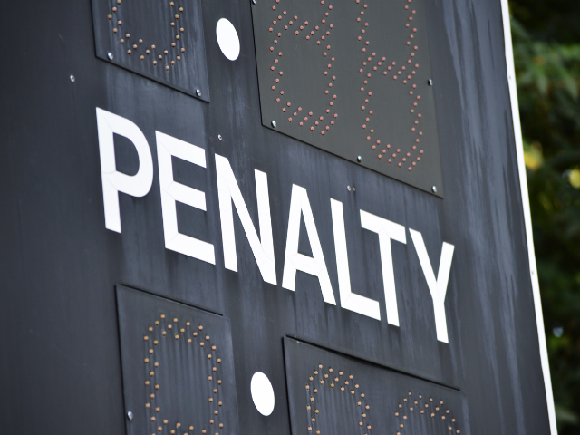 A scoreboard showing the word 'Penalty' in a rugby match.