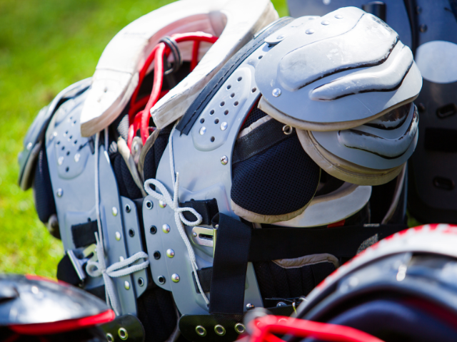 Close-up view of rugby shoulder pads and protective gear.