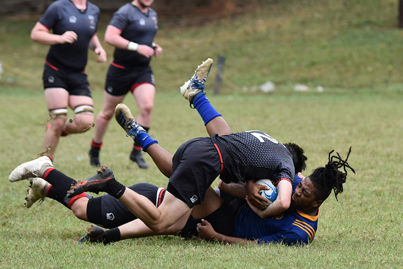 players-tackling-rugby-concussion-prevention