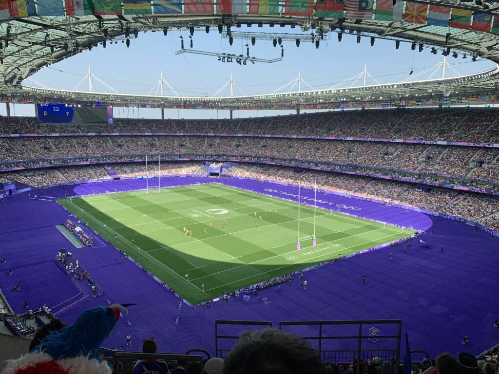 crowd watching rugby in a stadium