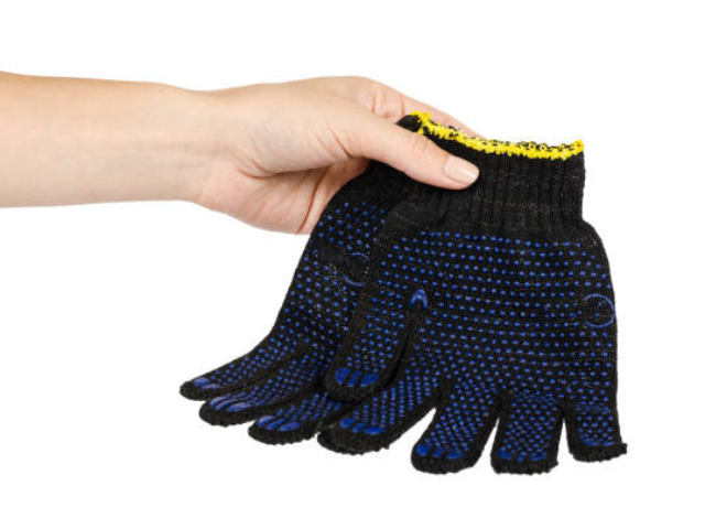 A pair of black and blue dotted work gloves held in one hand, showcasing their textured grip pattern.